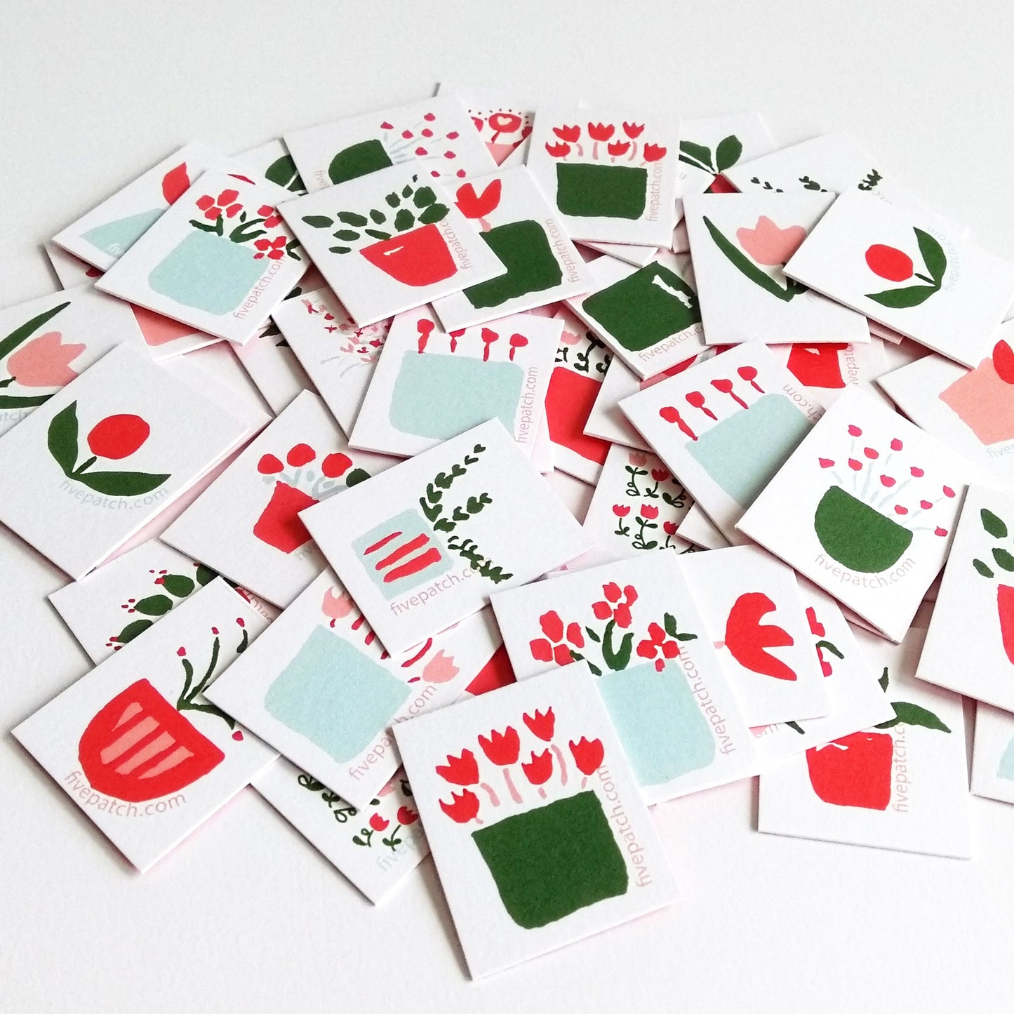 Five Patch Design Folk Plants Matching Game pieces shown in a pile