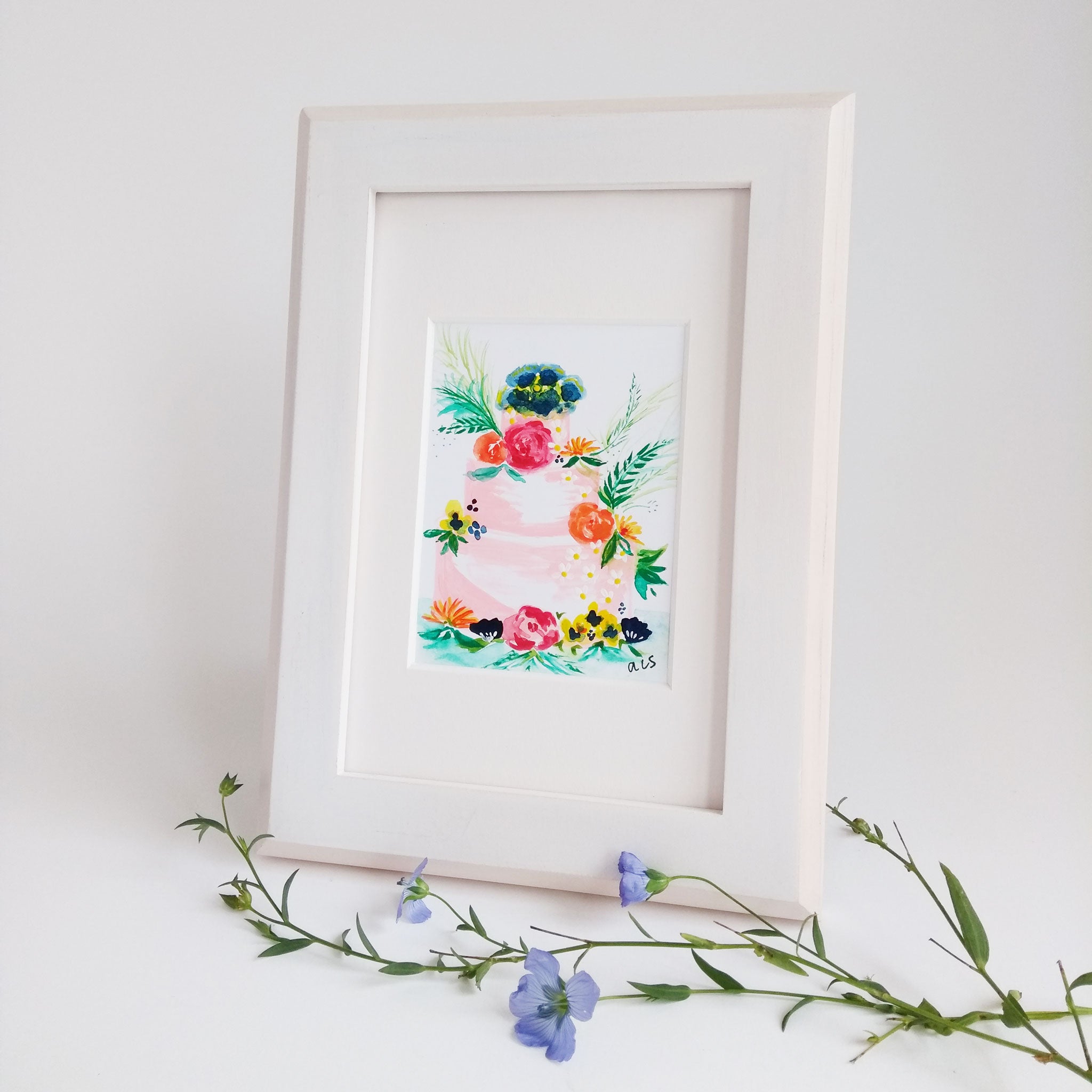 Five Patch Design Pretty in Pink Framed Botanical Cake Painting shown with stem and purple flowers